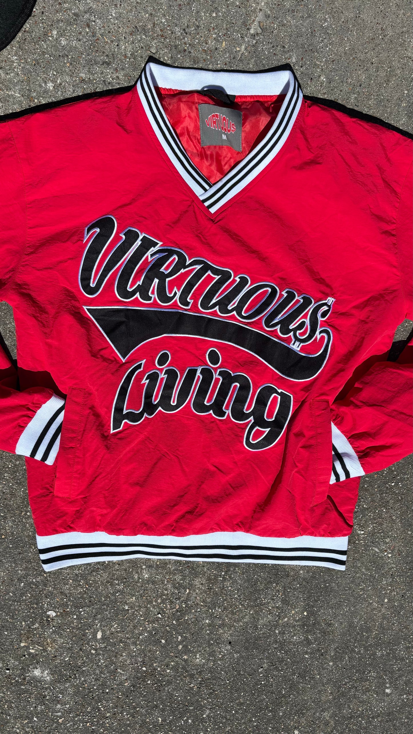 “Virtuous living” pullover windbreakers